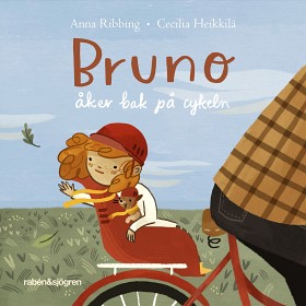 Bild på Bruno åker bak på cykeln