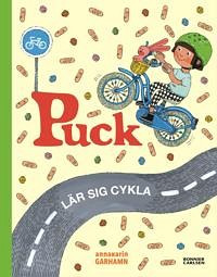 Bild på Puck lär sig cykla